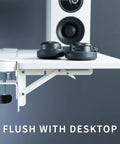 Close-up of White Clamp On Desk Extender For A Sweet Home Office Upgrade with headphones on shelf, flush with desktop.