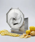 Manual Stainless Steel Slicing Machine With Guard Plate, Baffle And Hand Crank, Rust Resistant, Built To Last Home Kitchen Slicer beside sliced lemons and potatoes