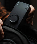 Person placing EVO 8 USB Audio Interface For Mac And Windows With 4 EVO Mic Pres JFET Instrument in bag