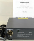 TP350 23 Amp DC 13.8V Switching Power Supply With Cigarette Plug For Ham Radio And CB Radios on a table with manual and cords.