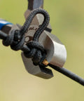 Close-up of Forty Pack Brass Bowstring Nock Points For Archery Tuning Durable Buckle Clips with Non Slip Nylon Lining