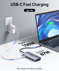 USB C Docking Station Beast For 3 Monitor Setup With Dual HDMI And DisplayPort Plus VGA, 100W PD Charging in use with laptop
