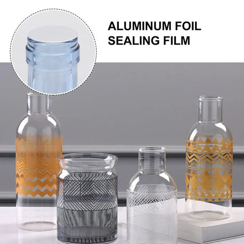Premium Aluminum Foil Seal Gaskets For Plastic Bottles and Glass Containers shown on assorted clear glass jars.