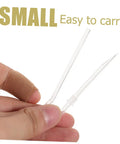 Small and easy to carry clear tool held in a hand with a bandaged finger, practical for various uses.