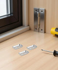 Stainless Steel Towel Bar Mounting Hardware Set With 45x26mm Backing Plates on wooden surface next to tools
