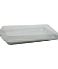 Clear 13 By 18 Inch Sheet Pan Cover Reusable Dishwasher Safe Fits Most Full Or Half Size Aluminum Pans stacked on a metal sheet pan