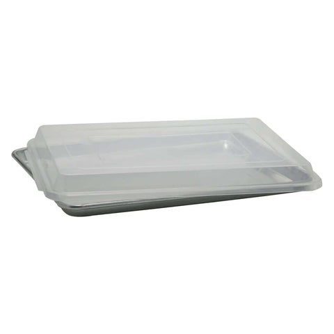 Clear 13 By 18 Inch Sheet Pan Cover Reusable Dishwasher Safe Fits Most Full Or Half Size Aluminum Pans stacked on a metal sheet pan