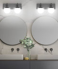 Matte Black Two Light Bathroom Wall Light Fixtures With Milky Glass Globes above round mirrors in modern bathroom setting