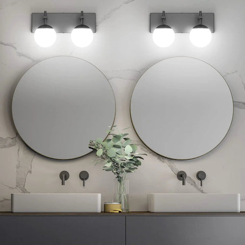 Matte Black Two Light Bathroom Wall Light Fixtures With Milky Glass Globes above round mirrors in modern bathroom setting