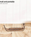 Dope Viking Dragon Ship Model Resin Sculpture for home decor on wooden desk, showing portable size and dragon head design.