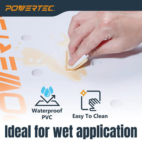 Arachni-Flex 24 By 48 Inch Waterproof PVC Foldable Workbench Tabletop shown being wiped clean with liquid spill