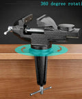 Heavy Duty Clamp On Vise With 360 Degree Rotating Jaw, 3.2 Inch Wide Jaw, showing edge mount on wooden surface, black finish