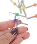 Close-up of a hand holding a carbide micro drill bit from the Dope Carbide Micro Drill Bits Set For Jewelry Making And PCB Engraving.