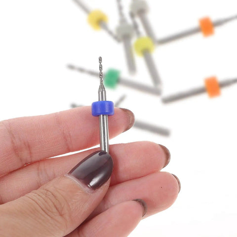 Close-up of a hand holding a carbide micro drill bit from the Dope Carbide Micro Drill Bits Set For Jewelry Making And PCB Engraving.