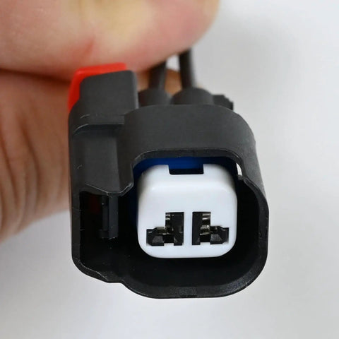 Close-up of Abs Wheel Speed Sensor Connector Pigtail Wiring Harness with black casing and visible connectors