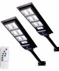 Two Pack Solar Street Lights Outdoor With Motion Sensor 10000LM Dusk To Dawn Flood Lights IP66 Waterproof LED Security Light For Parking Lot Yard Street Basketball Court displayed with remote control