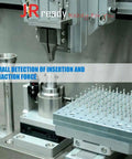 Automated machine performing insertion and extraction force tests on electronic components in a laboratory setting.
