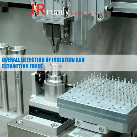 Automated machine performing insertion and extraction force tests on electronic components in a laboratory setting.
