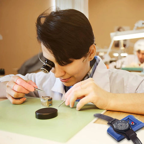 Watchmaker using Pro Grade Watch Demagnetizer Tool For Mechanical Timepieces 110V Degauss Device with a mechanical watch on the table