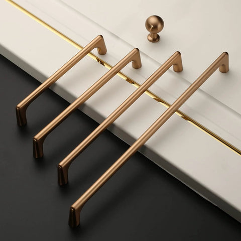 Four Champagne Bronze Cabinet Pulls 5 Inch Center To Center Pack Of 10 With Screws Included Kitchen Cabinet Handles on a white surface