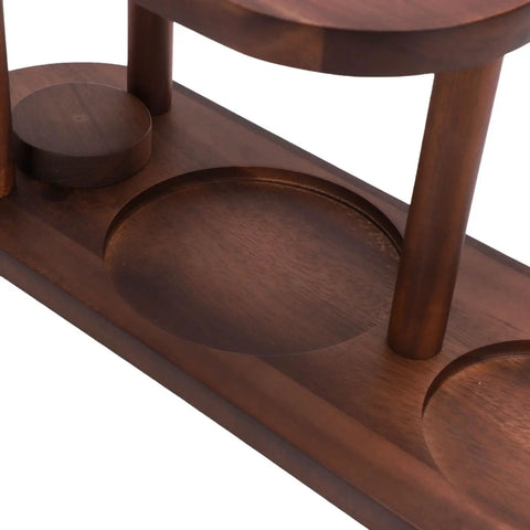 Close-up of the handcrafted solid wood pour over coffee station with elevated dripper stand and spill catching tray.