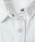 Close-up of installed snap from 200 Pack Stainless Steel Snap Fastener Kit 15mm Heavy Duty Button Press Stud Caps on white fabric