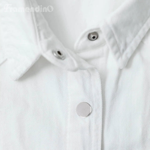 Close-up of installed snap from 200 Pack Stainless Steel Snap Fastener Kit 15mm Heavy Duty Button Press Stud Caps on white fabric