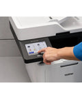 Person using touchscreen on Professional Monochrome Laser All In One Printer With Scanner And Copier Lightning Fast 50 Ppm Printing Wireless Network Ready With Dual Band WiFi Auto Duplex Print For Busy Offices Model MFC L5915DW