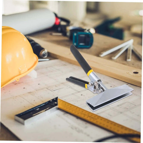 Ergonomic Hand Seamer Tool for Metal Bending with Built Tough Durable Construction and Wide Head for HVAC on a workbench.