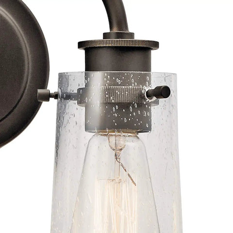 Close-up of Industrial Vintage Two Light Vanity Light With Clear Seeded Glass In Olde Bronze Finish For Bathroom Or Powder Room
