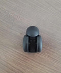 Slick Black Twin Wheel Swivel Caster With M10 Threaded Stem viewed from above, ideal for smooth chair replacement.