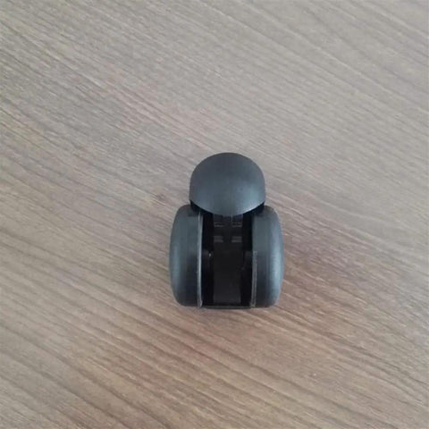 Slick Black Twin Wheel Swivel Caster With M10 Threaded Stem viewed from above, ideal for smooth chair replacement.