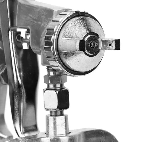 Close-up of Premium Pneumatic Paint Spray Gun Featuring 2.0 Mm Suction Feed Nozzle, showcasing nozzle detail for precision use.
