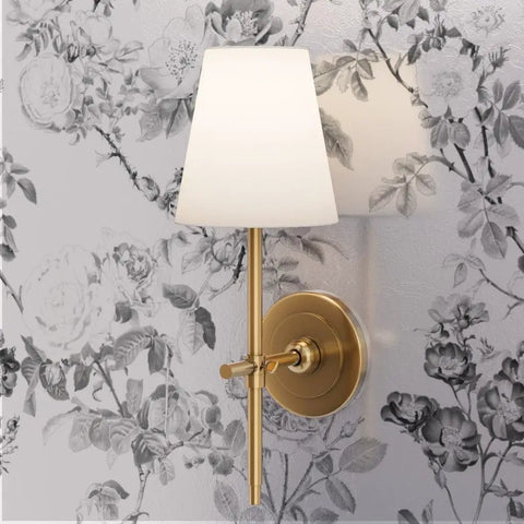 Premium Floral Toile Cottage Wallpaper With Glamorous Silver Metallic Finish Eco Friendly PVC Free Wall Covering with a gold wall sconce.