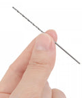 Person holding a Five Pack 1.2mm Micro Twist Drill Bits Set, Pro Grade High Speed Steel With Straight Shank, Extra Long 65mm Length