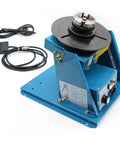 3 Jaw Rotary Welding Positioner Turntable With 2.5 Inch Mini Lathe Chuck 110V Plug And Play Setup For Steel Pipe Flanges, features foot pedal and control panel.