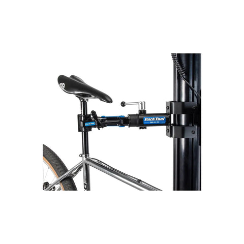 Heavy-Duty Fixed Mount Clamp Kit For Bicycle Repair Stands Aluminum Construction with bike secured for maintenance