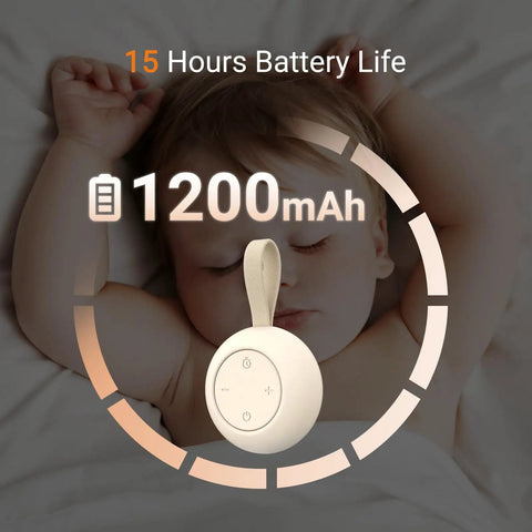 On The Go Baby Sleep Sound Machine With 12 Soothing White Noise Tracks USB Recharge 15 Hour Battery Life next to sleeping baby