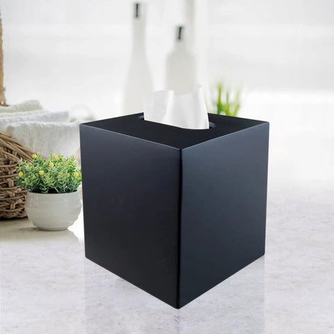 Square Tissue Box Cover In Matte Black Metal, Durable Facial Tissue Holder for bathroom vanity, shown in bright elegant setting.