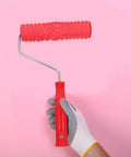 Premium Textured Rubber Paint Roller For Wall Decor And DIY Room Makeovers Featuring A Crystal Clear Embossed Design held in hand.