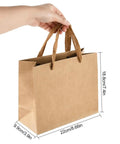 Hand holding Kraft Paper Gift Bags Set Of 20 For Birthday Bashes And Weddings, Great For Guest Favors, with size measurements.