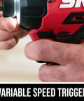 Close-up of hand using Rock Solid Brushless 20 Volt Compact Impact Driver Kit featuring variable speed trigger for precision control.