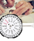 Watchmaker working with Three Hands Quartz Movement With Date Display Replacement For Watch Repairs and Watchmakers Dual Calendar Pro