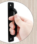 Hand holding 12 Pieces Aluminum Alloy Barn Door Handles 148mm 5.8 Inch Sliding Pulls For Cabinets Closets Drawers Black Finish