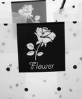 Clear plastic flower packaging bags with handle for bouquets, showing rose design, easy to carry floral wrapping for weddings.
