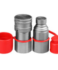 Two metal hydraulic quick-connect couplers with 3/4 in NPT threads and red protective caps.
