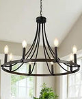 Farmhouse Wagon Wheel 8 Light Pendant Chandelier In Matte Black Iron With Vintage Wood Grain Look, Candle Style Bulbs shown installed