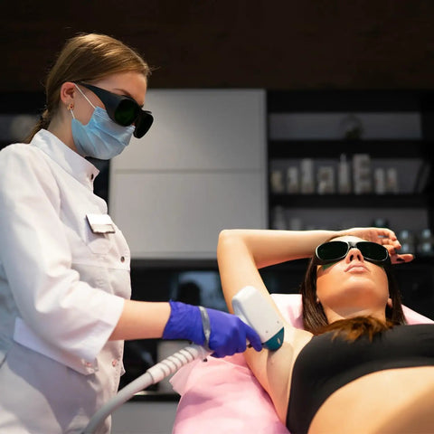 Top Shelf Laser Safety Eyewear Engineered For Red Light Therapy Clinics And At Home Hair Removal Gear With Heavy Duty 200 To 2000Nm Uv Blocking And Infrared Shielding Dark Green Lenses worn during laser hair removal treatment.