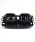 Center dash A/C vent panel with dual rectangular vents; black plastic with foam seals and yellow mounting clips