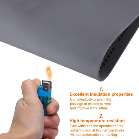 Hand holding a lighter near the gray Anti Static Foldable Non Slip Premium Flexible Silicone Soldering Mat 15 Point 8 By 11 Point 8 Inches.